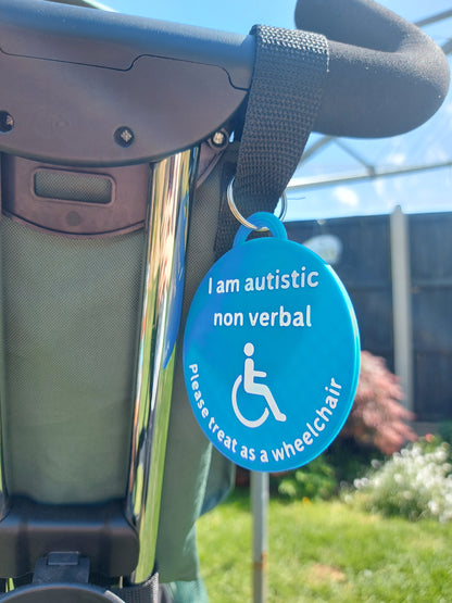 Blue tag on a wheelchair indicating the user's needs