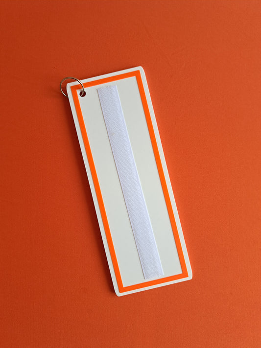 Rectangular white visual timetable with orange border on an orange background