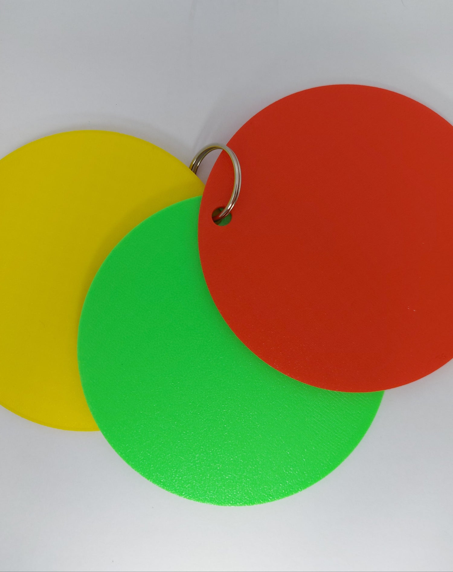 Behaviour and routine support tool with 3 traffic light visual aid discs for home, therapy, or school.