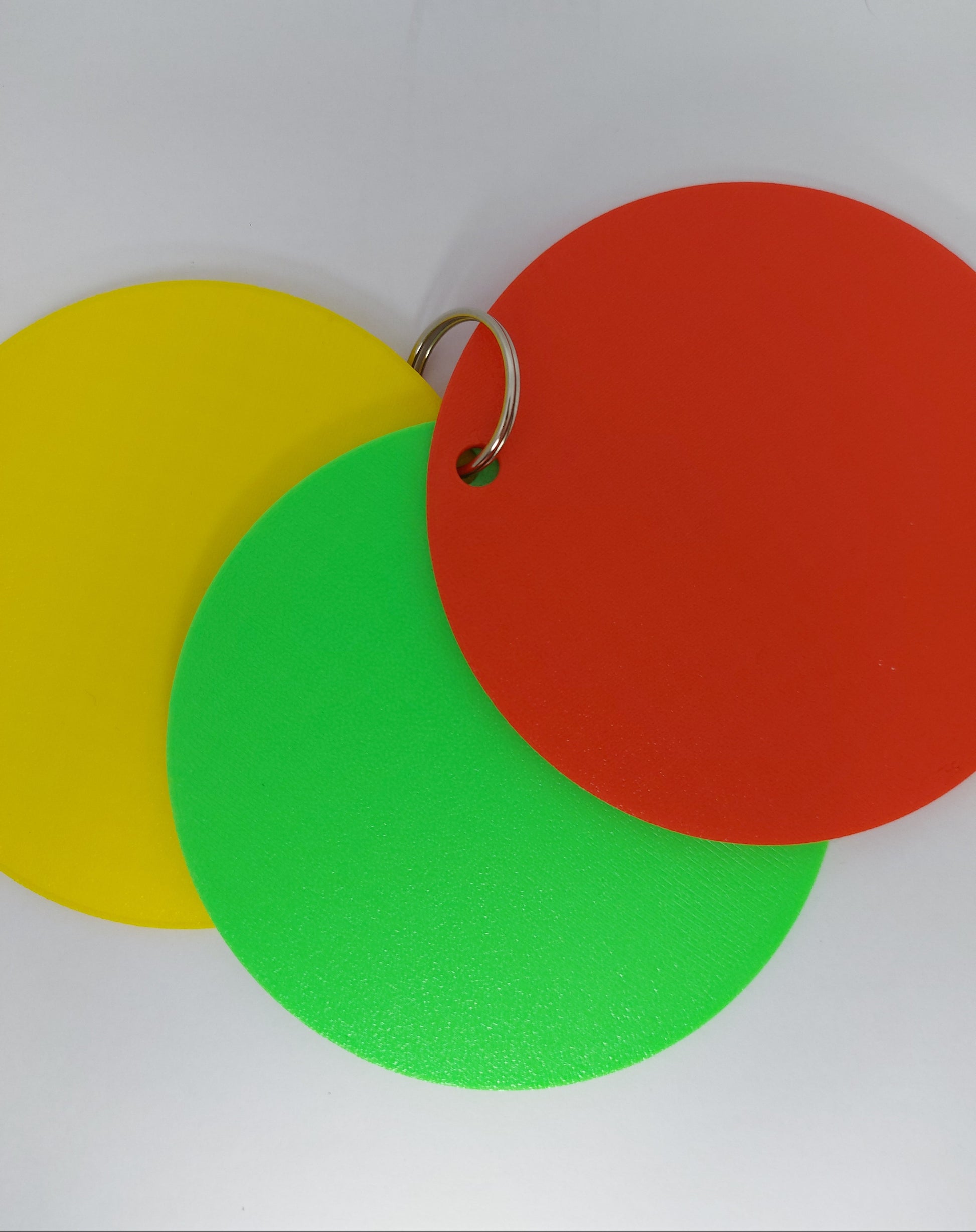 Behaviour and routine support tool with 3 traffic light visual aid discs for home, therapy, or school.