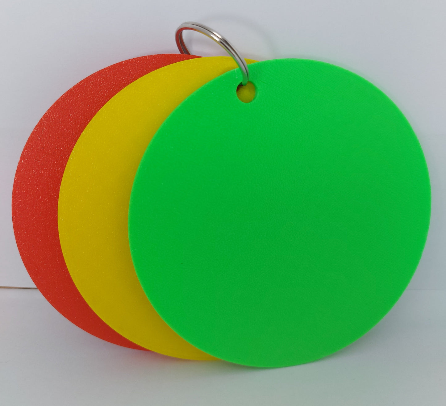 Set of 3 durable 10cm traffic light visual aid discs in red, yellow, and green for SEN classrooms or home use.